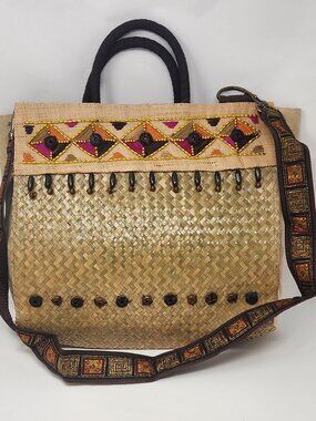 New straw bag with brown handle